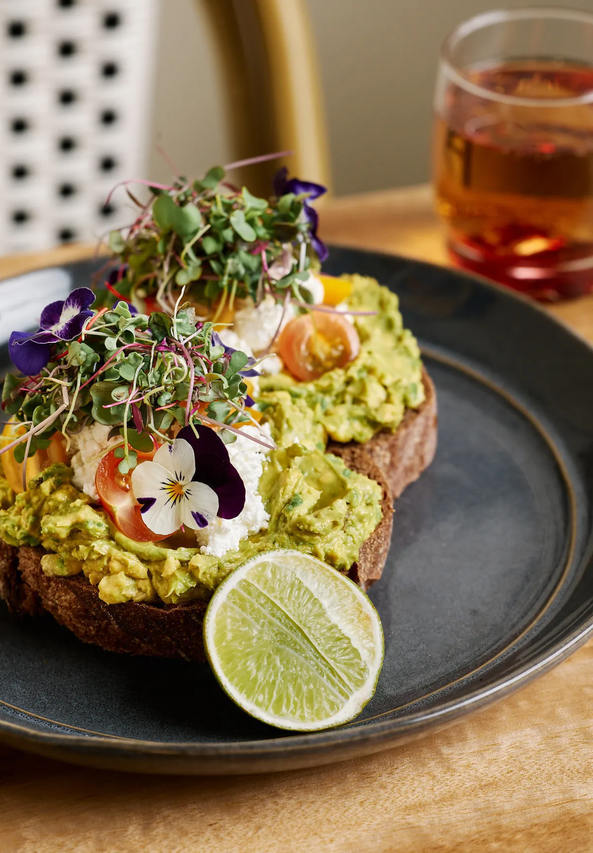 Smashed avo toast with edible flowers