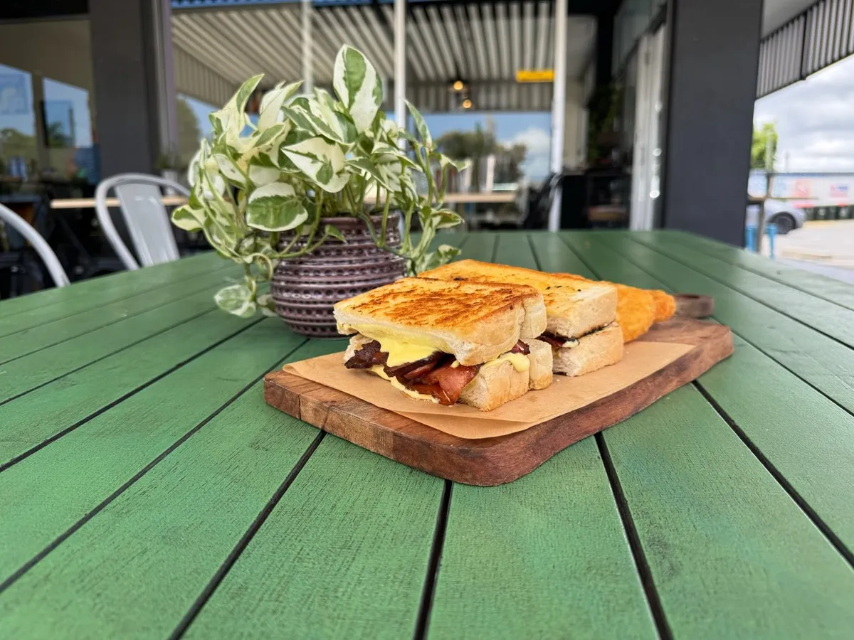 The Maple Rascal — maple glazed bacon with hollandaise on fried bread
